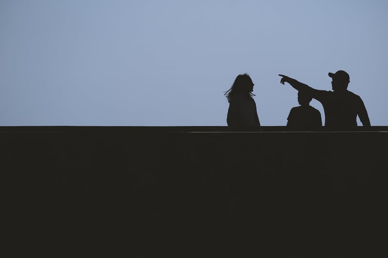 Silhouette of people communicating